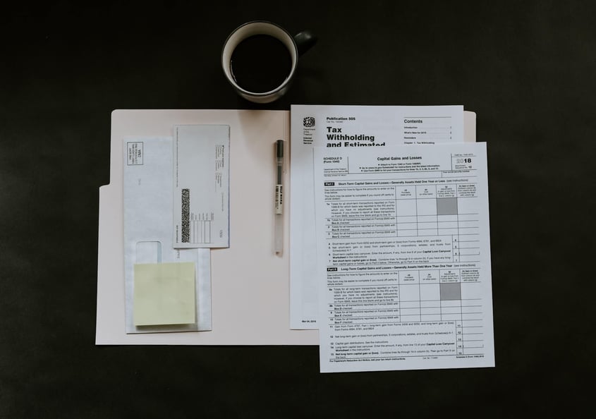 Tax forms on table.